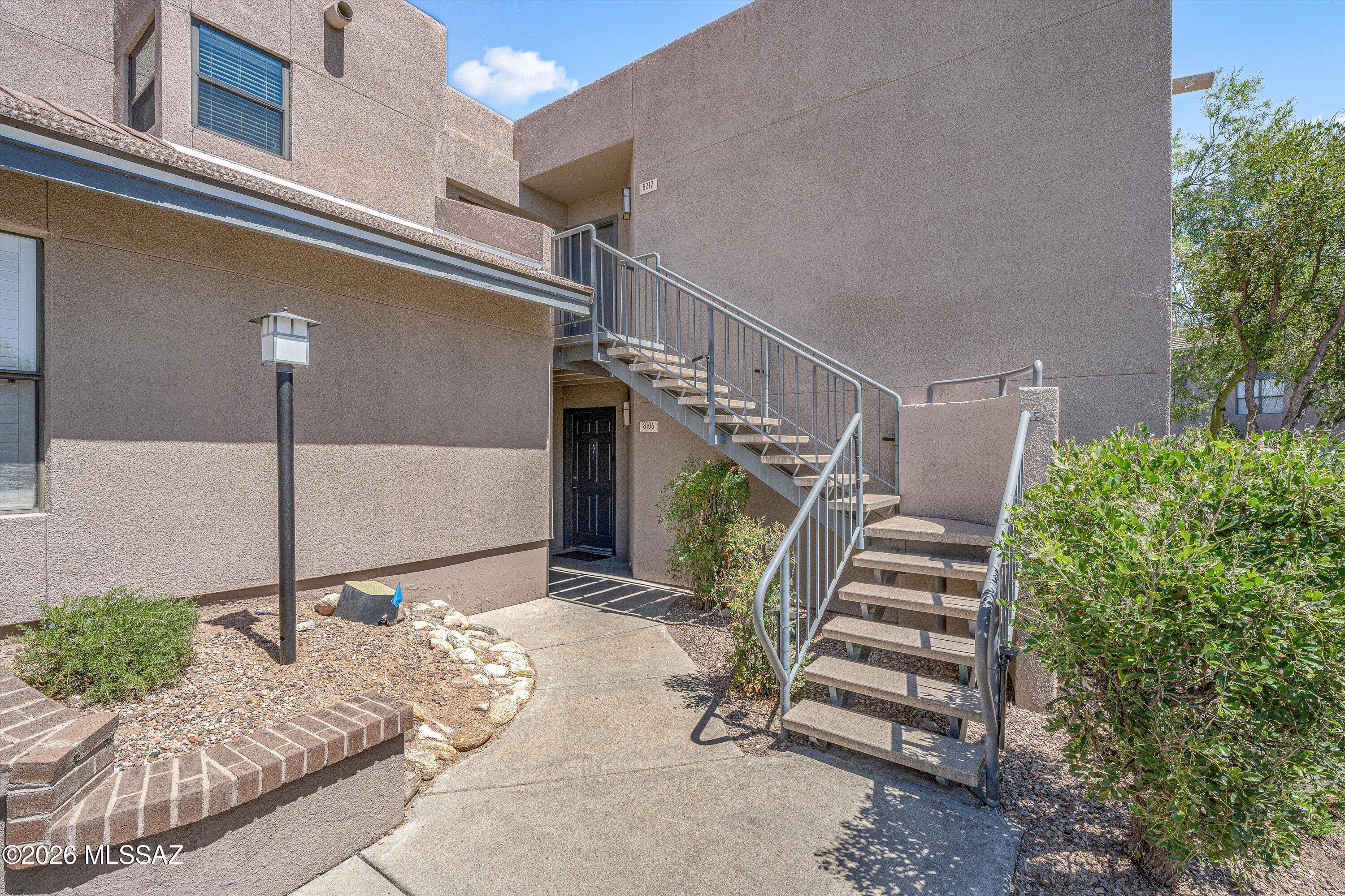 a view of entryway with a front door