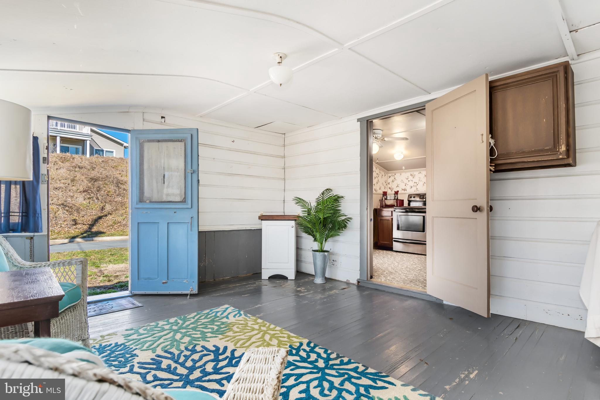 221 Riverview Road Stevensville, MD 21666 - Photo 6 of 39 front entrance rd. side porch