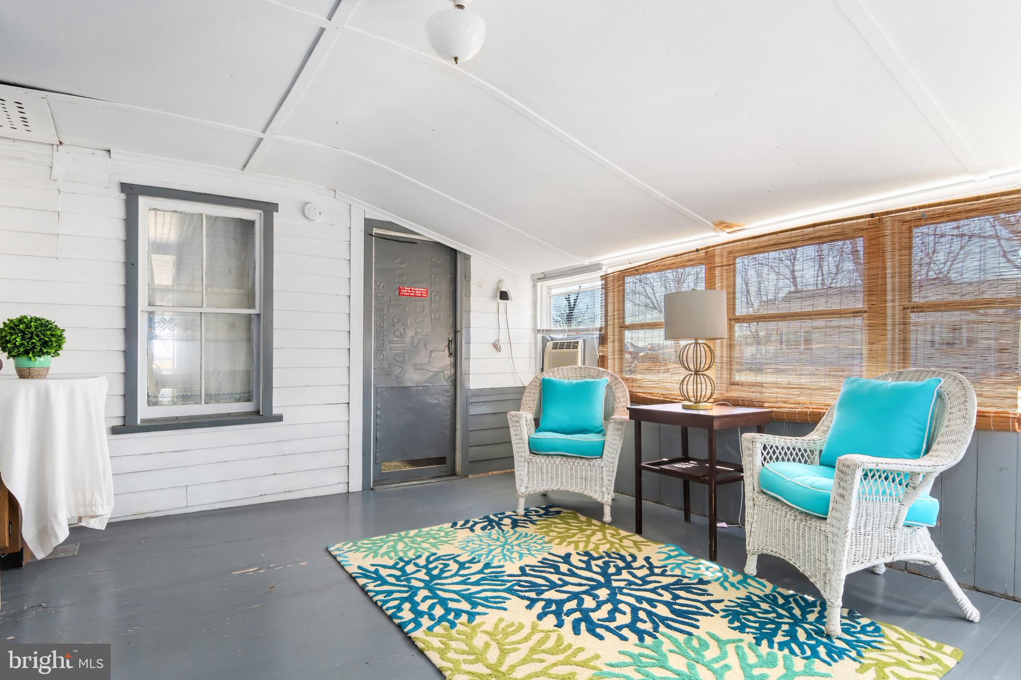 221 Riverview Road Stevensville, MD 21666 - Photo 7 of 39 Front porch enclosed.