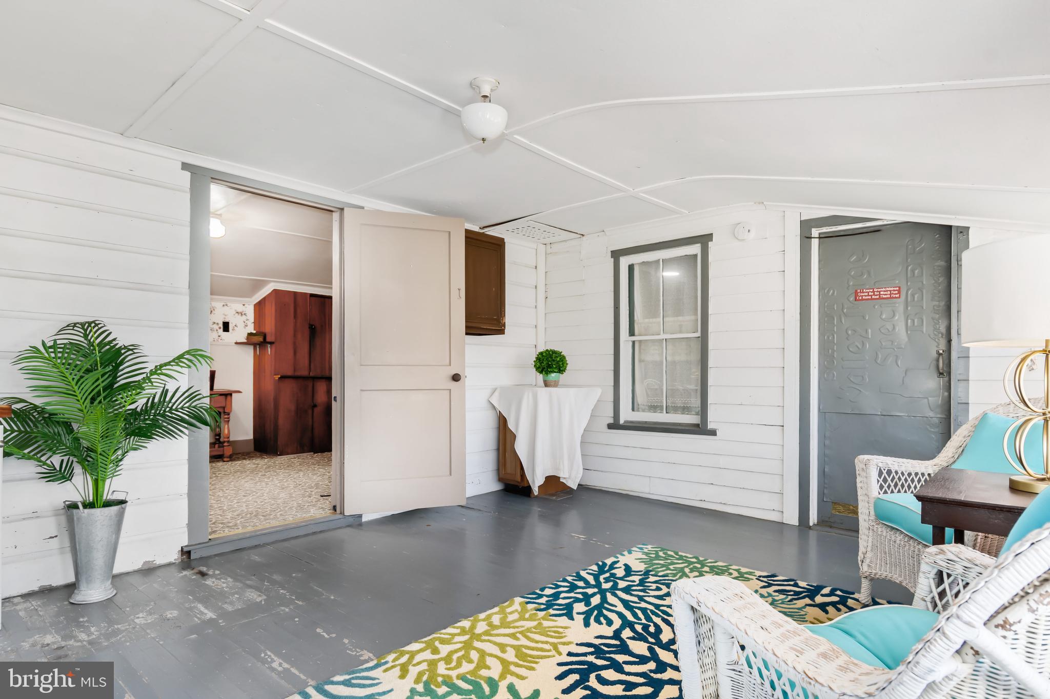 221 Riverview Road Stevensville, MD 21666 - Photo 8 of 39 Front porch enclosed.