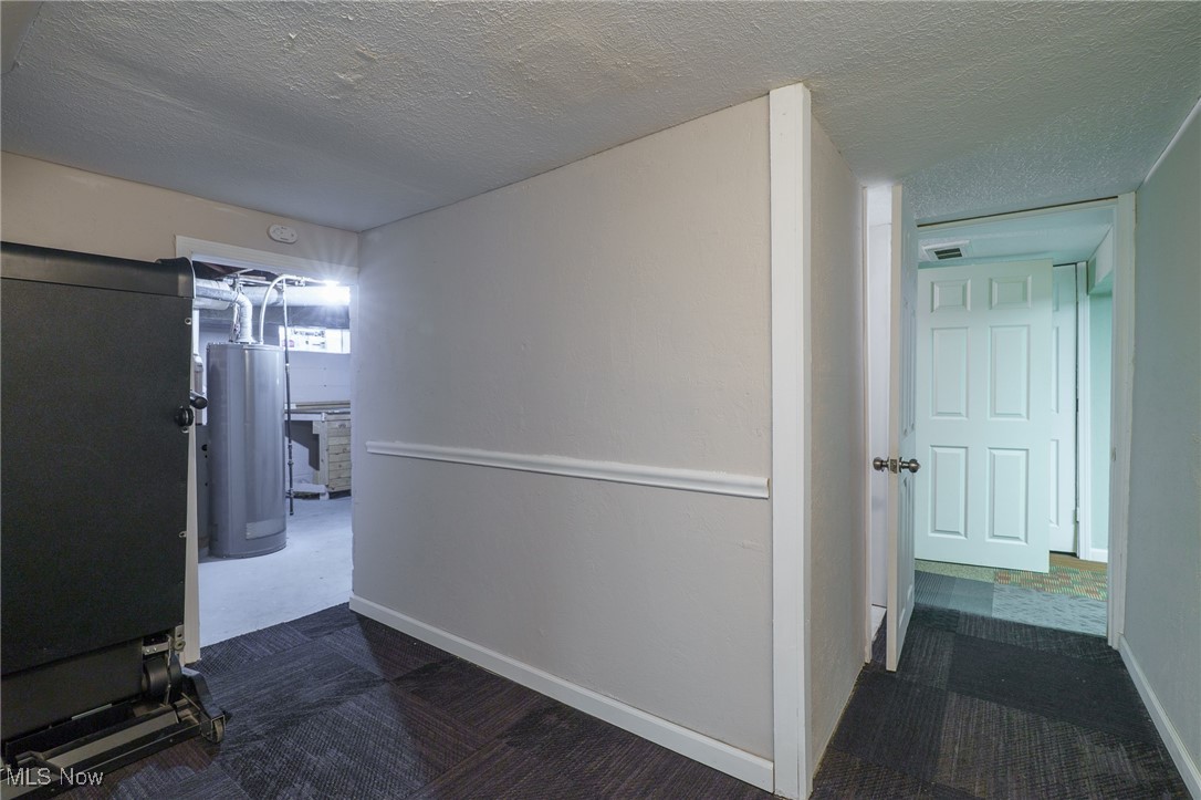 3165 East Sprague Road Independence, OH 44131 - Photo 30 of 41 another wonderful room in basement with treadmill near utility area