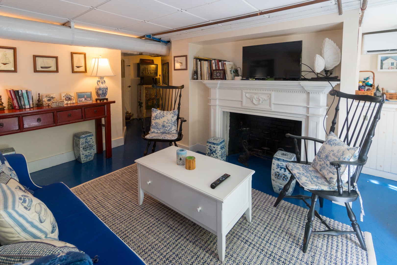 37 Union Street Nantucket, MA 02554 - Photo 19 of 25 a living room with furniture and a fireplace