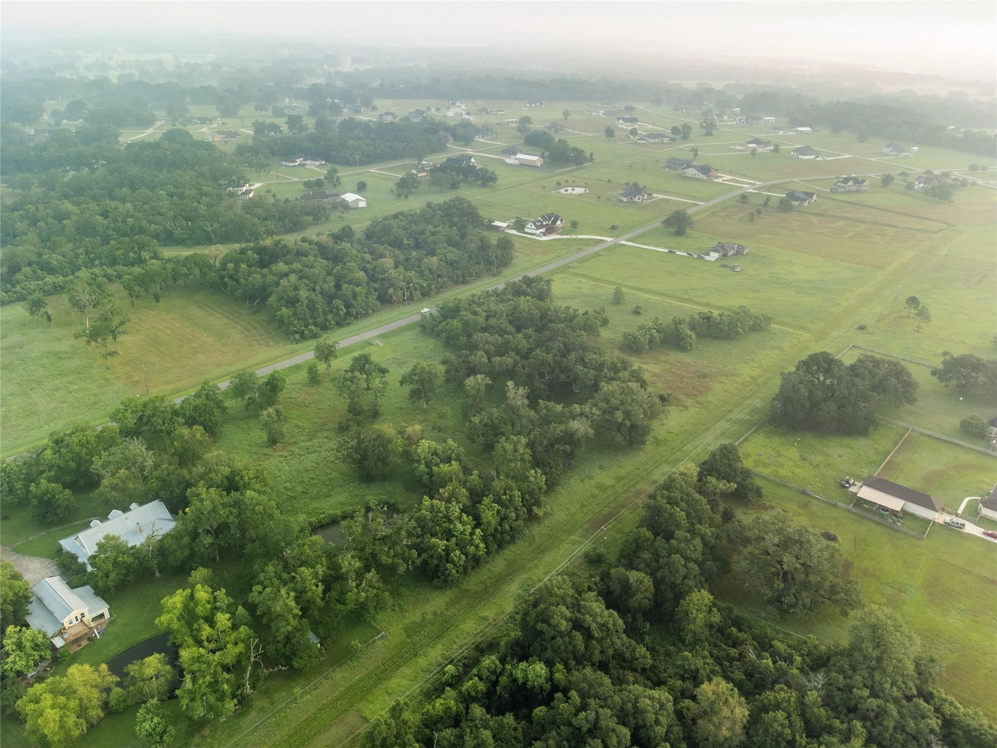 814 Cross Timbers Drive Rosharon, TX 77583 - Photo 3 of 5 a view of a lake view with lots of trees
