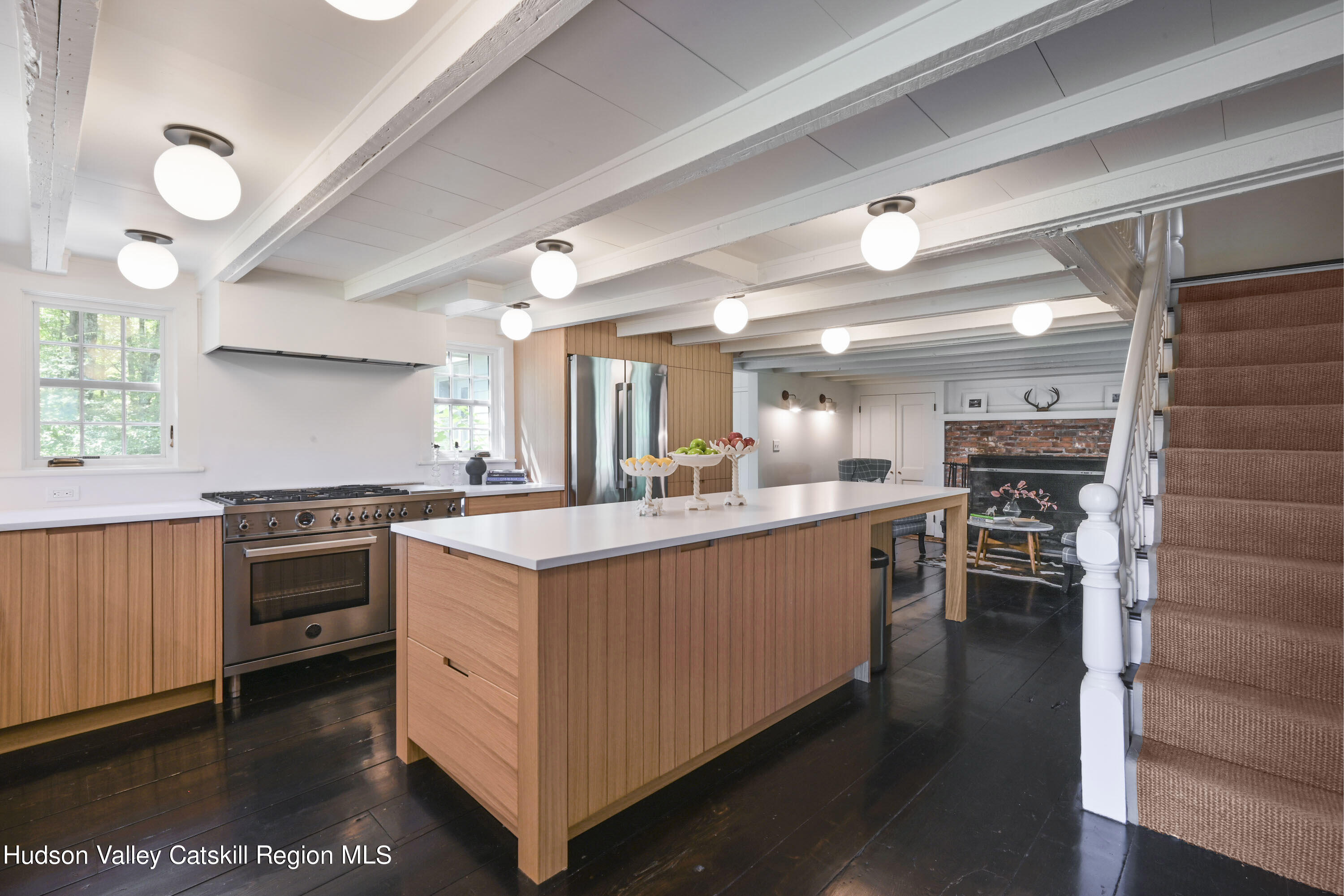 351 Peak Road Stone Ridge, NY 12484 - Photo 11 of 32 a kitchen with stainless steel appliances granite countertop a stove and cabinets
