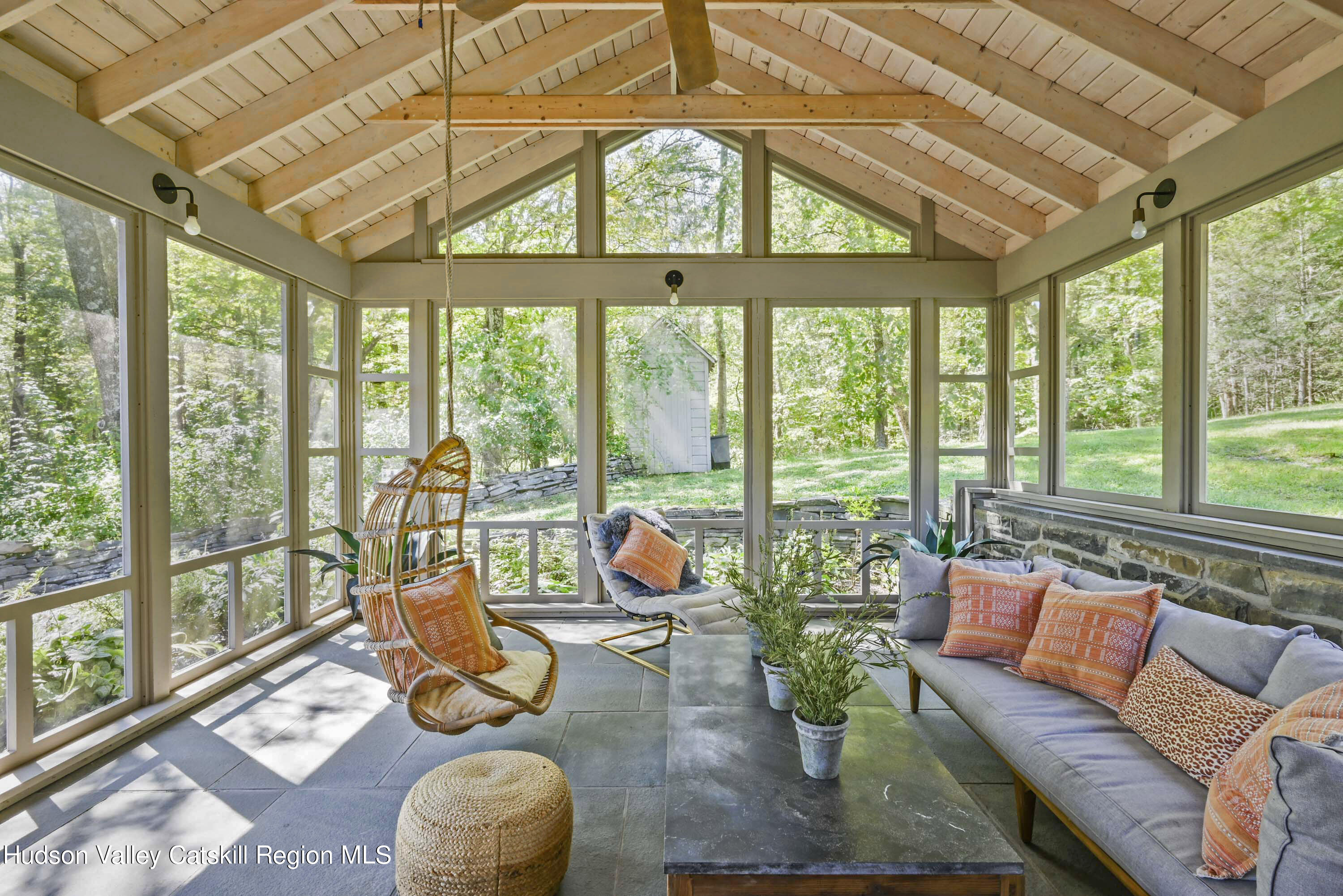 351 Peak Road Stone Ridge, NY 12484 - Photo 2 of 32 a living room with furniture and floor to ceiling windows