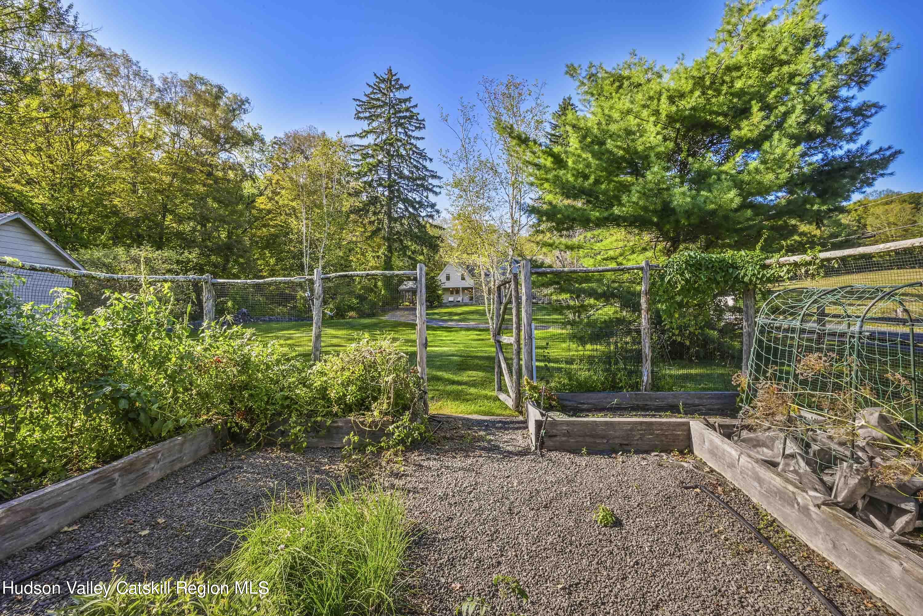 351 Peak Road Stone Ridge, NY 12484 - Photo 31 of 32 a view of a yard with a tree