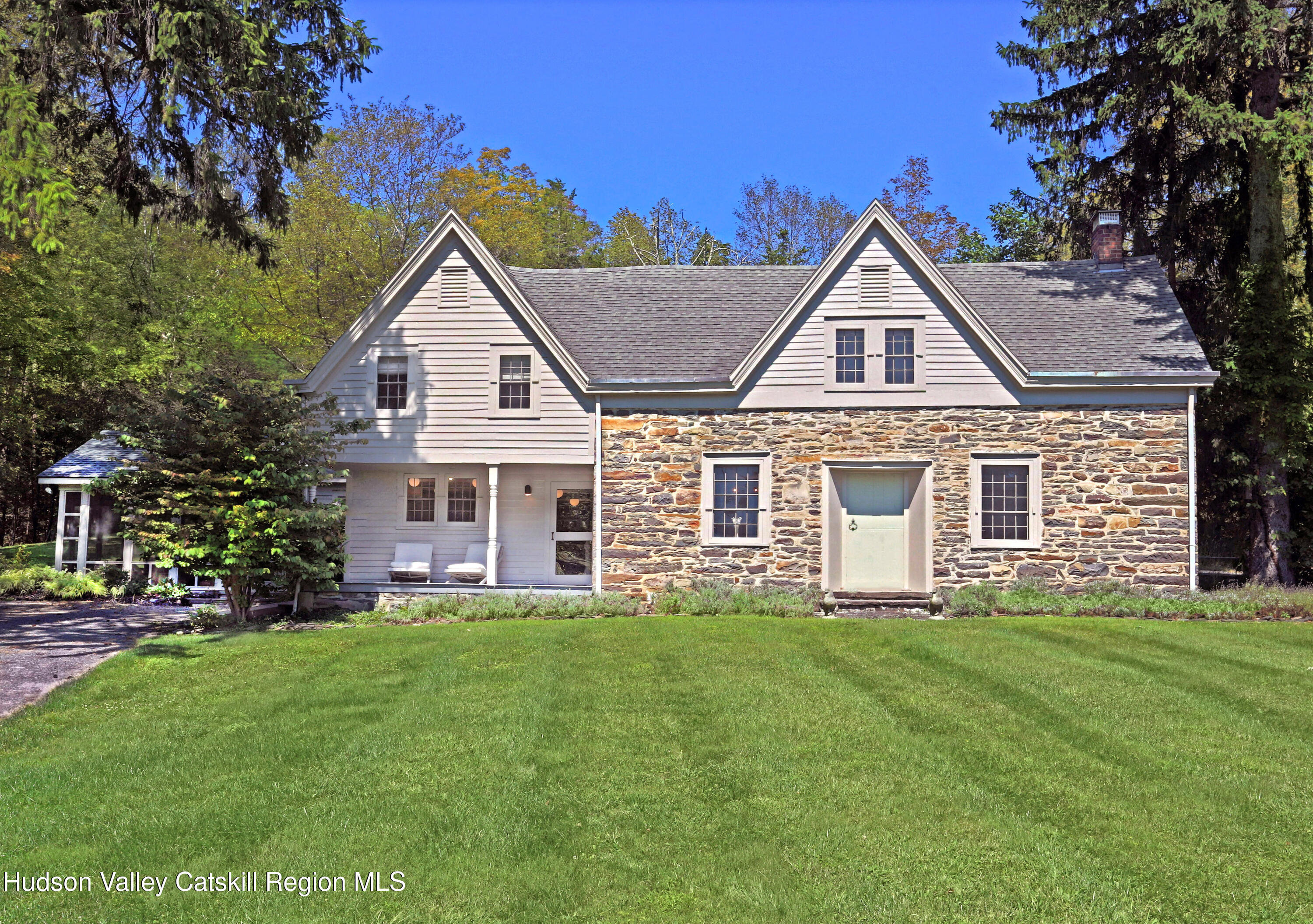 351 Peak Road Stone Ridge, NY 12484 - Photo 32 of 32 a front view of a house with a yard