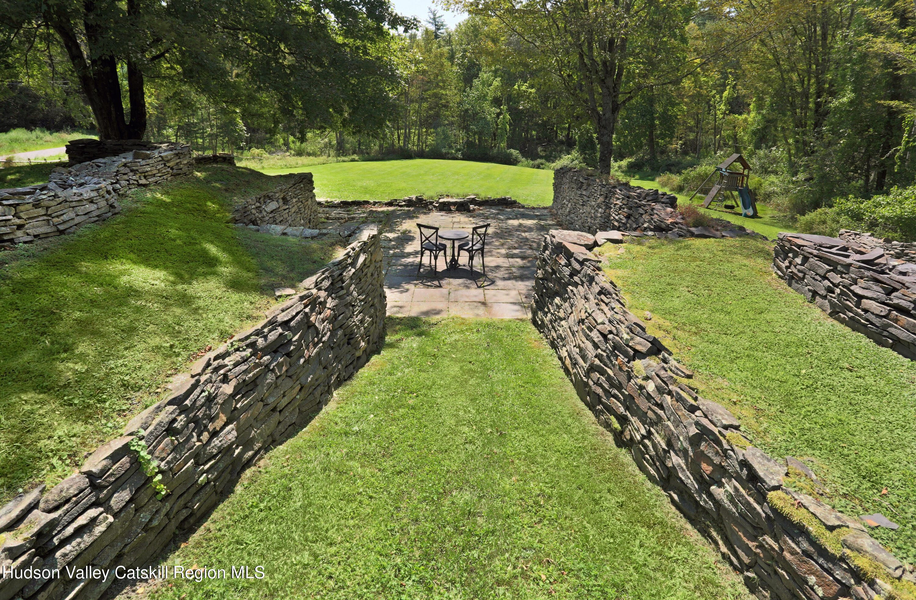 351 Peak Road Stone Ridge, NY 12484 - Photo 8 of 32 a view of a yard with an outdoor seating