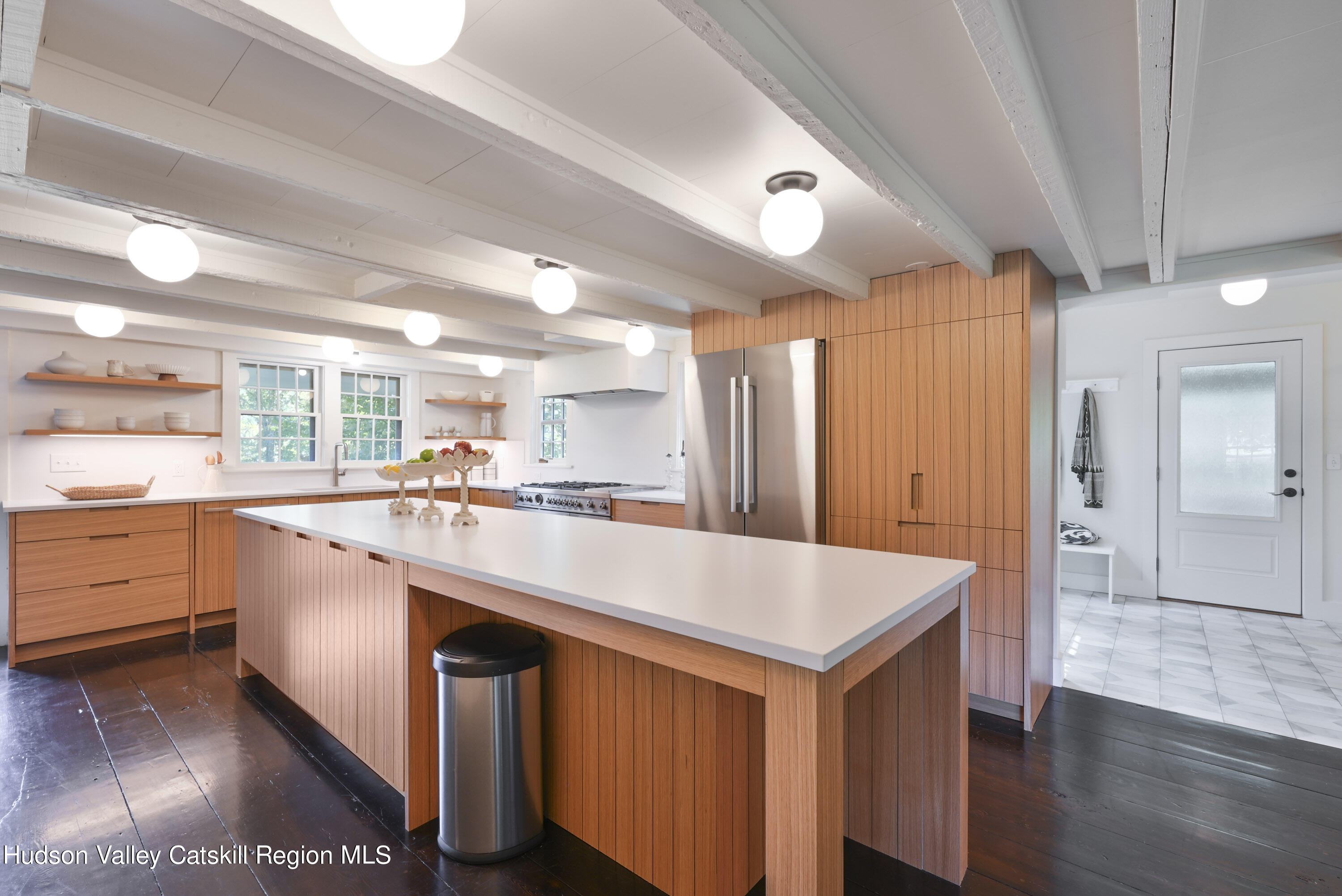351 Peak Road Stone Ridge, NY 12484 - Photo 10 of 32 a kitchen with cabinets and wooden floors