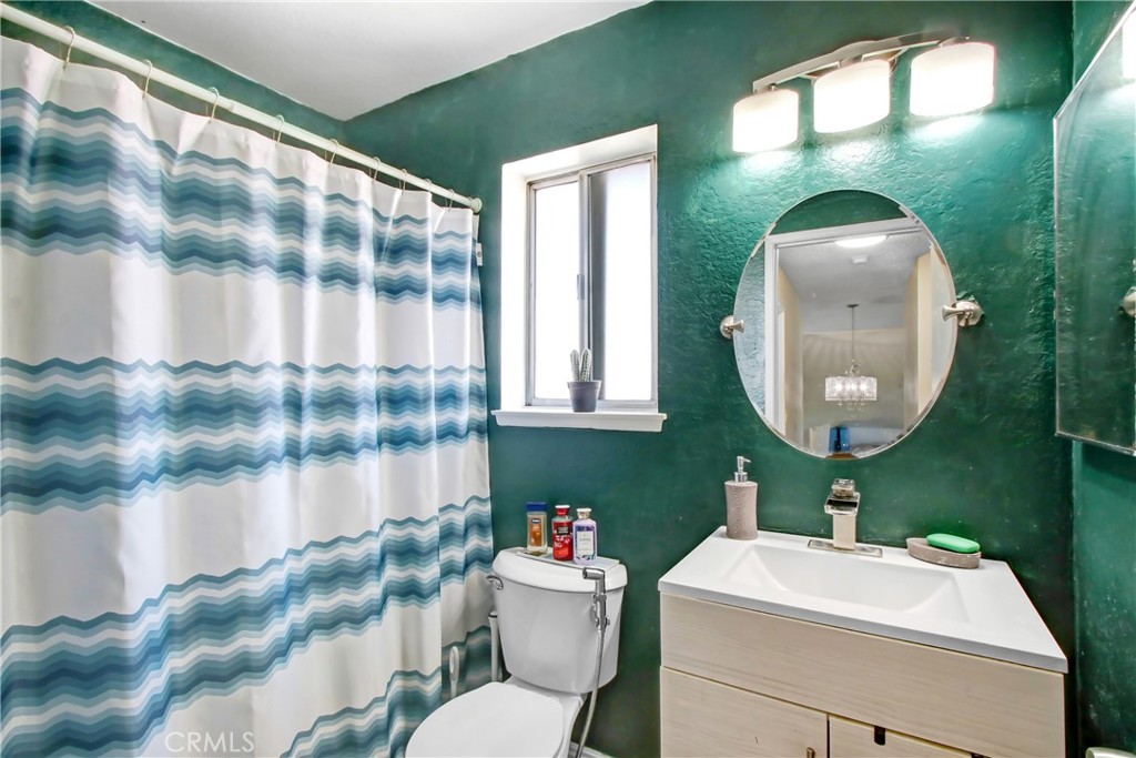 142 South Lamarr Street Rialto, CA 92376 - Photo 11 of 19 Upstairs hall bathroom