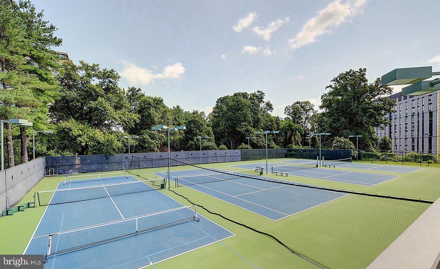 5225 Pooks Hill Road, Unit 303S Bethesda, MD 20814 - Photo 15 of 19 Inviting tennis courts in lush setting.