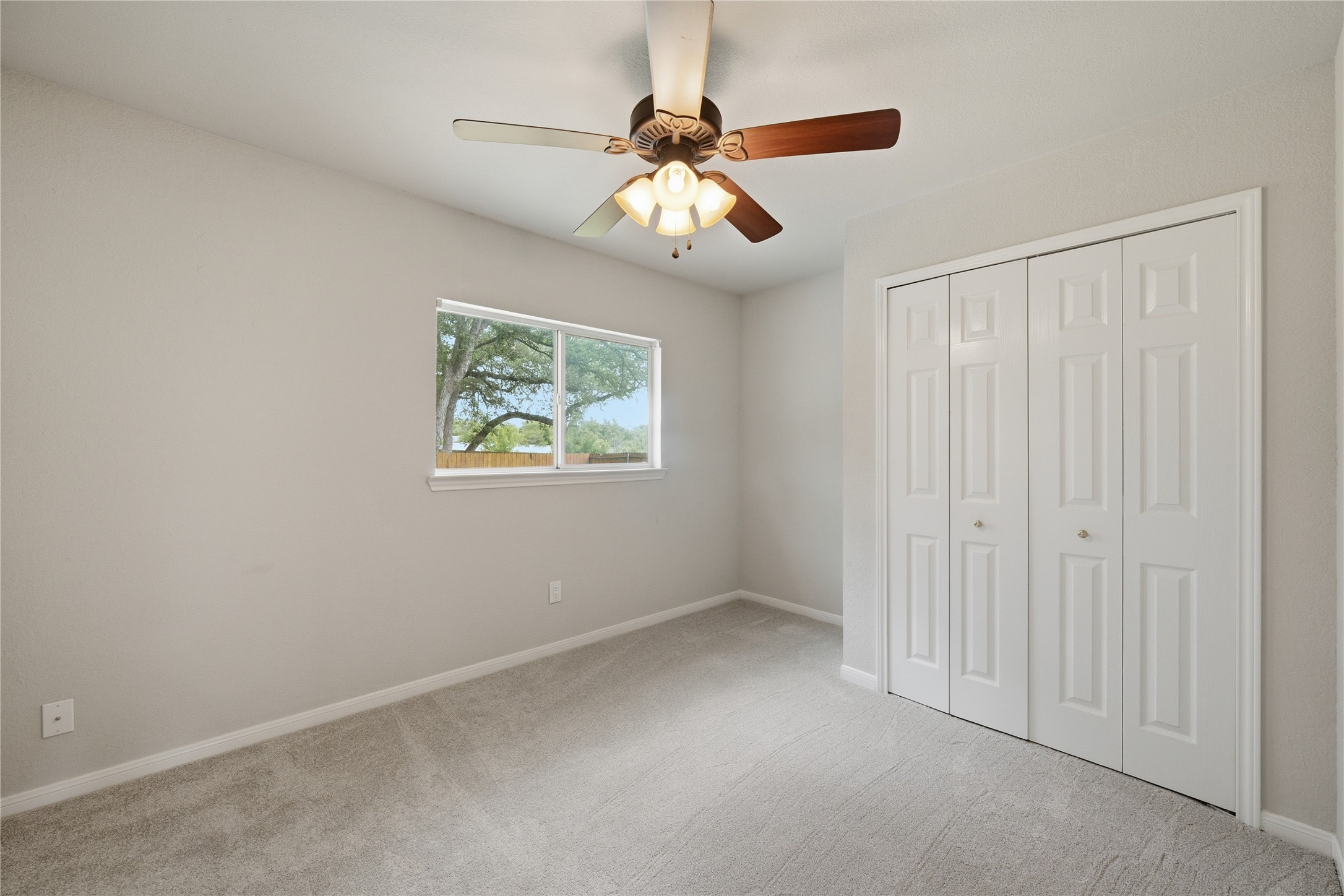 1317 Mimosa Pass Cedar Park, TX 78613 - Photo 18 of 20 an empty room with fan and windows