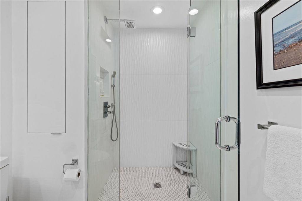 80 Broad Street, Unit 808 Boston, MA 02110 - Photo 19 of 27 a bathroom with a shower