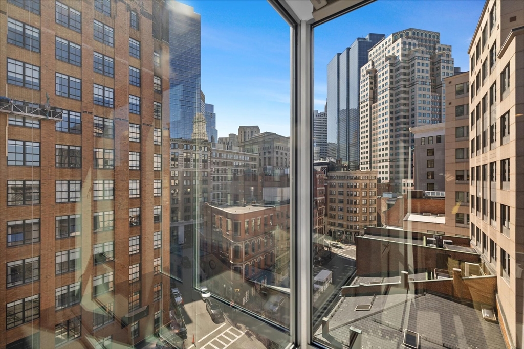 80 Broad Street, Unit 808 Boston, MA 02110 - Photo 2 of 27 a view of a tall building
