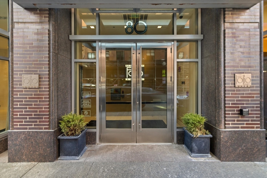 80 Broad Street, Unit 808 Boston, MA 02110 - Photo 24 of 27 a view of a entryway door front of house
