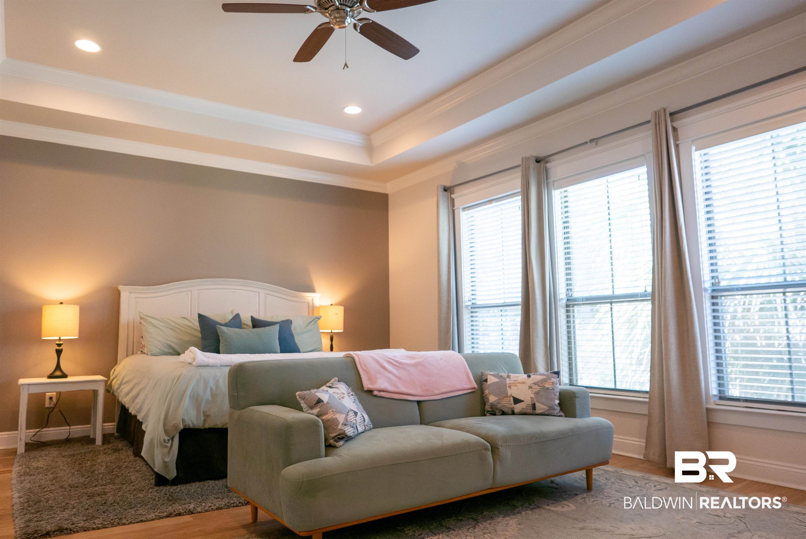 6684 Garrison Drive Daphne, AL 36527 - Photo 10 of 35 Bedroom featuring light hardwood / wood-style flooring, multiple windows, and ceiling fan