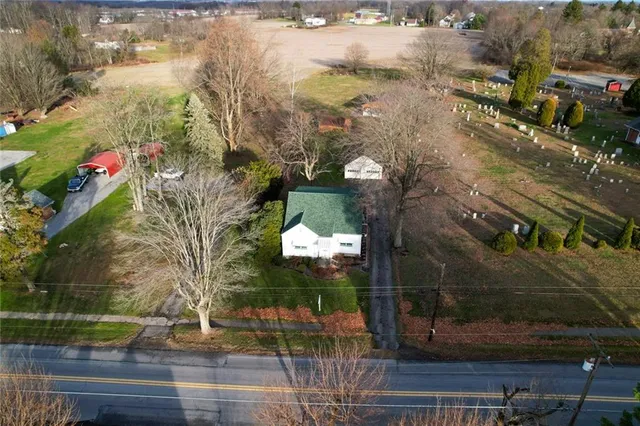 a view of a fountain in the middle of a city