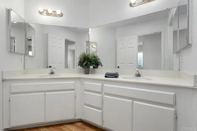 a white toilet and a bath tub