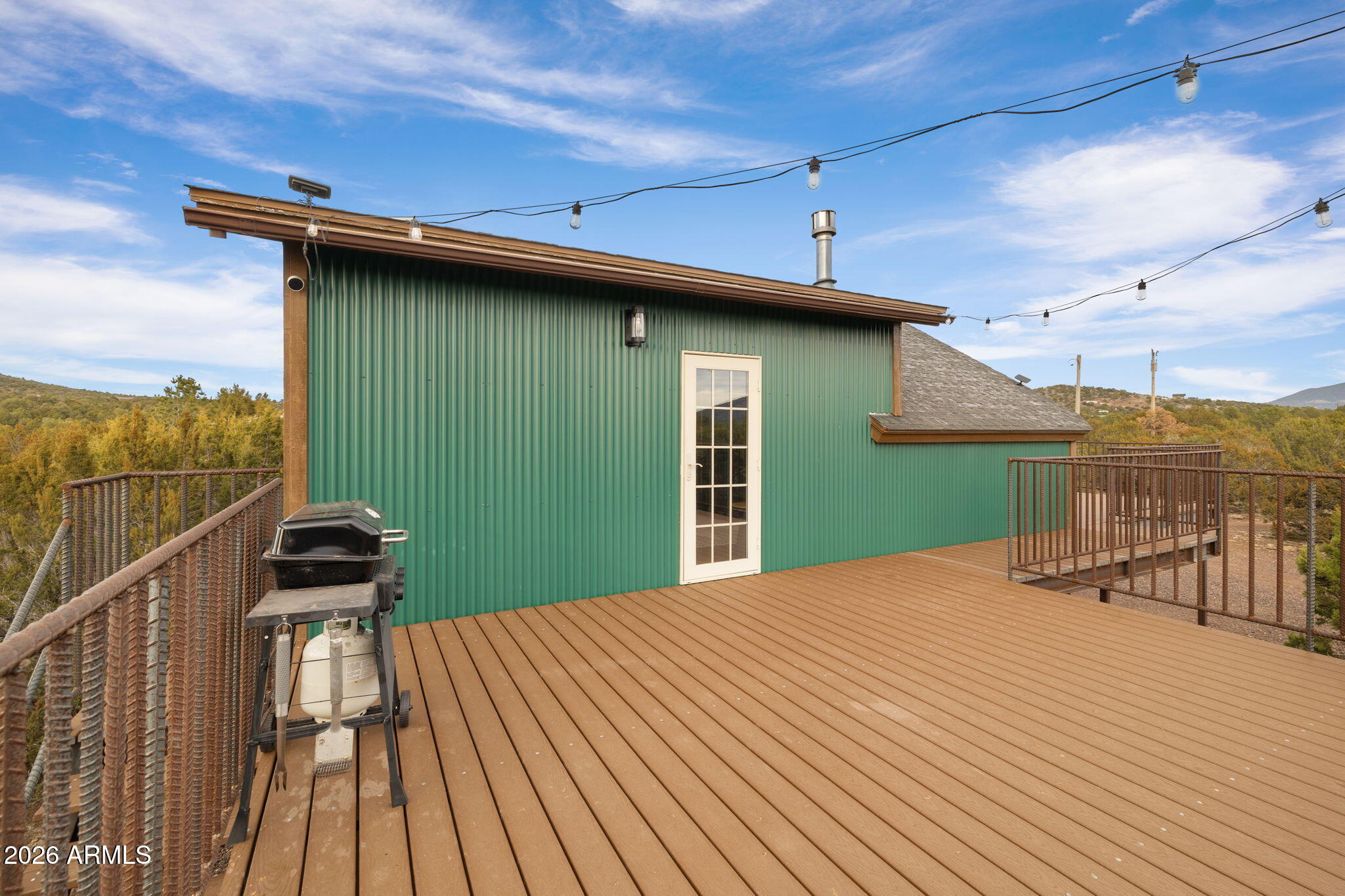 9042 North Red Fox Lane Williams, AZ 86046 - Photo 47 of 56 a view of a backyard with sitting area