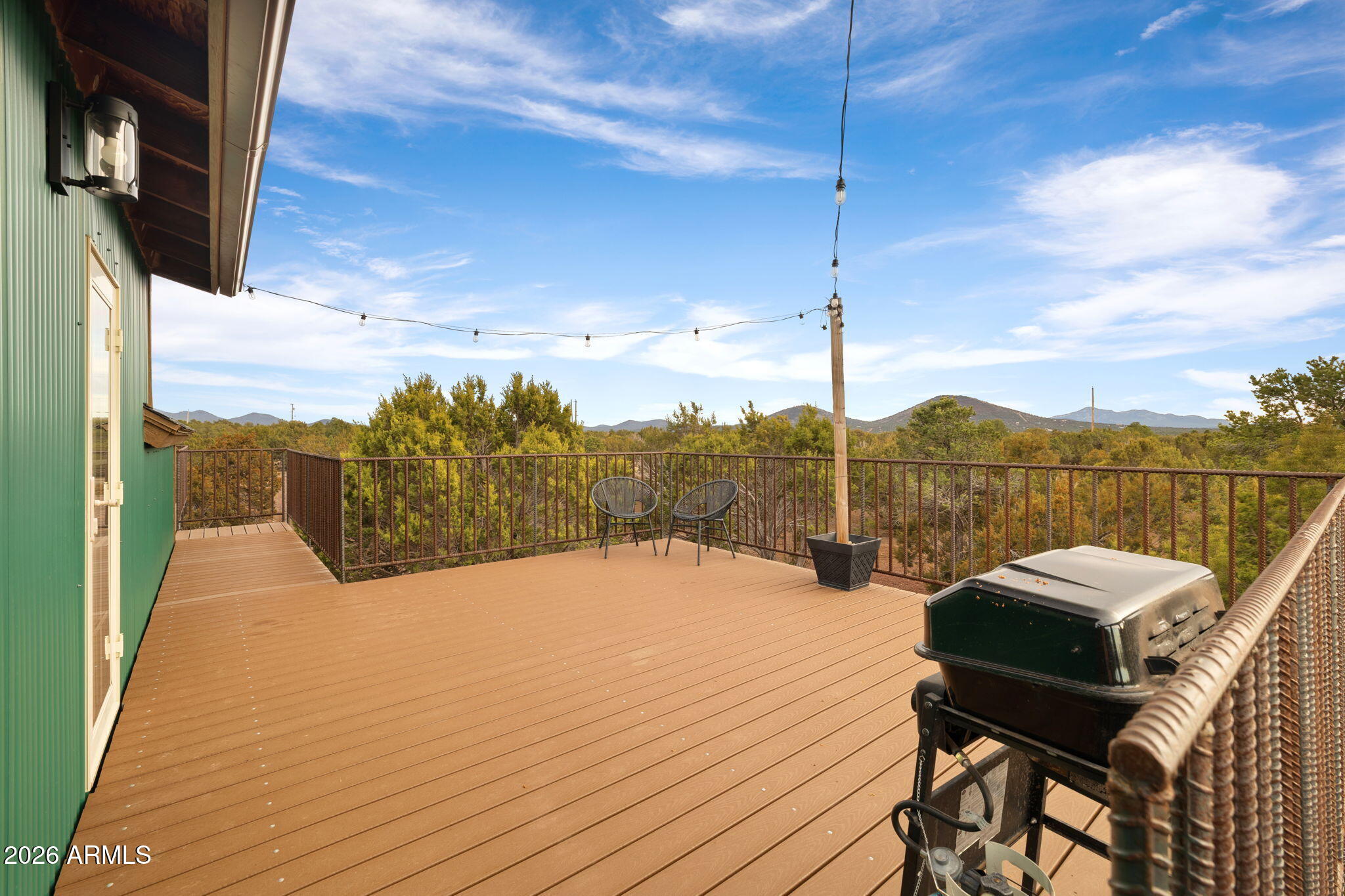 9042 North Red Fox Lane Williams, AZ 86046 - Photo 48 of 56 a balcony with furniture and city view
