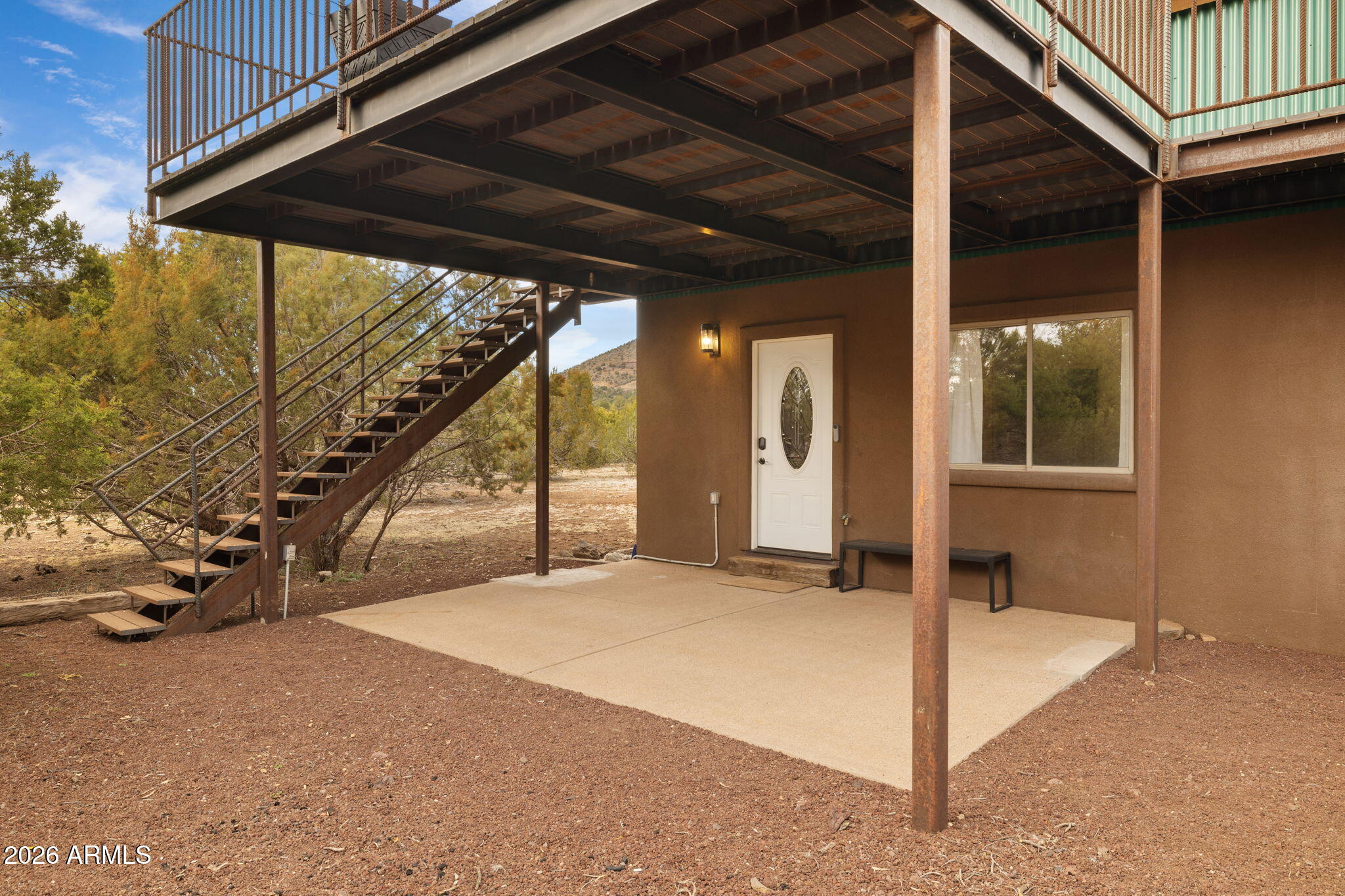9042 North Red Fox Lane Williams, AZ 86046 - Photo 50 of 56 a view of an empty room with a balcony