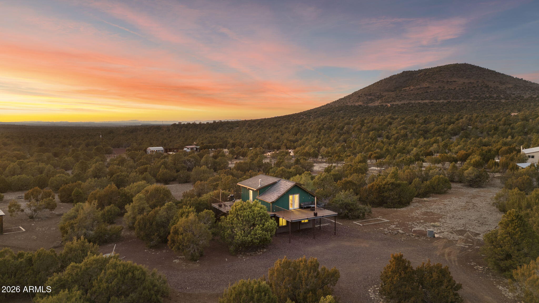 9042 North Red Fox Lane Williams, AZ 86046 - Photo 5 of 56 a view of a town with mountains in the background