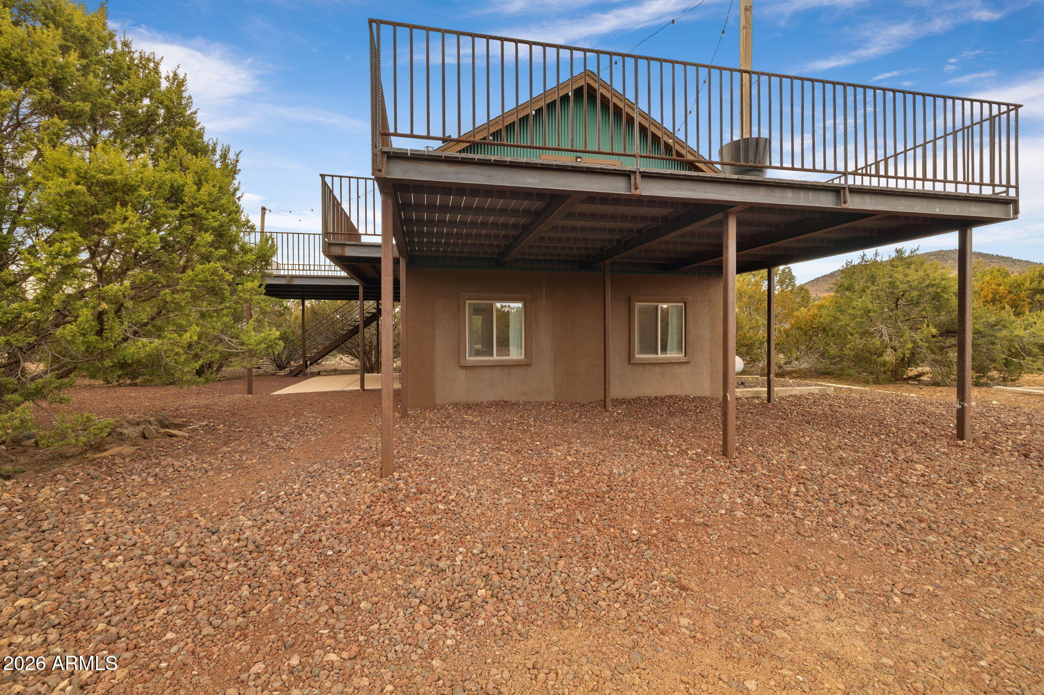9042 North Red Fox Lane Williams, AZ 86046 - Photo 51 of 56 a view of entryway with an outdoor space