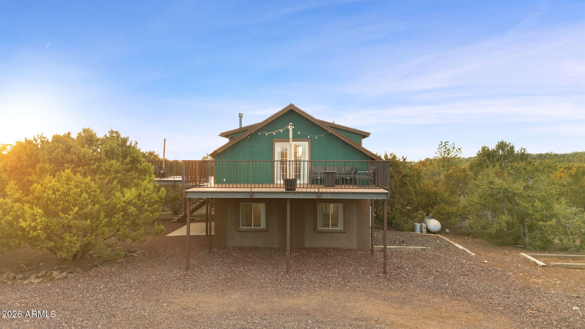 9042 North Red Fox Lane Williams, AZ 86046 - Photo 55 of 56 a view of house with outdoor space and sitting area