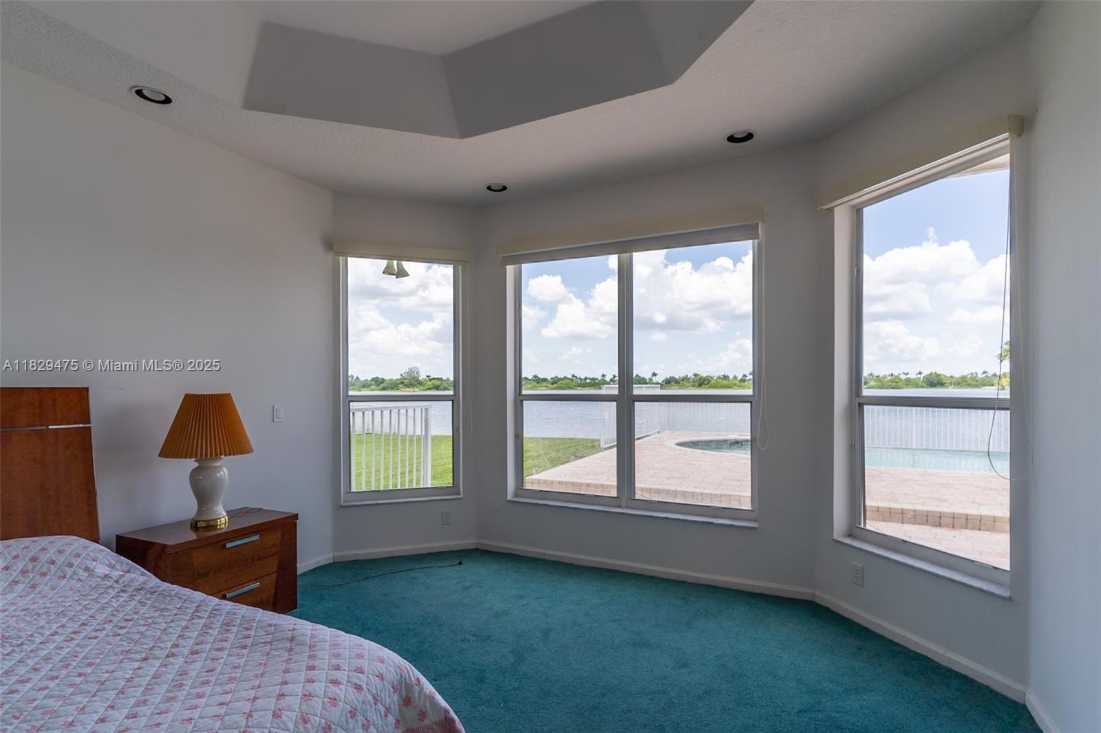 17999 Southwest 35th Street Miramar, FL 33029 - Photo 12 of 14 a bedroom with a bed and window