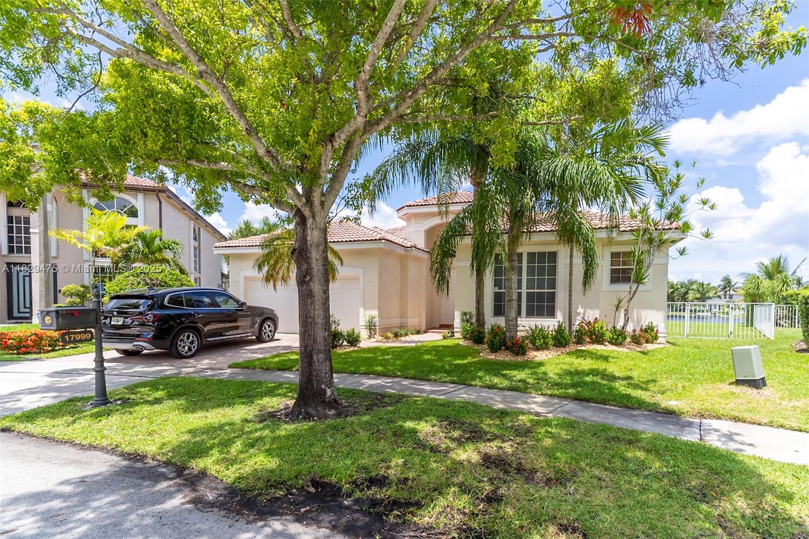 17999 Southwest 35th Street Miramar, FL 33029 - Photo 2 of 14 a view of a house with backyard and a tree