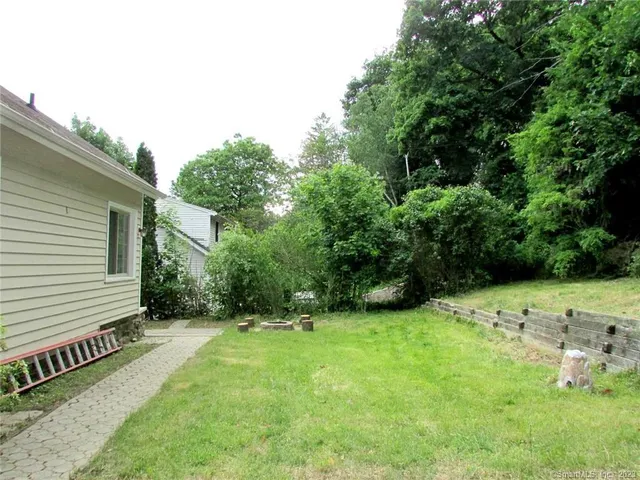 a view of a backyard with a garden
