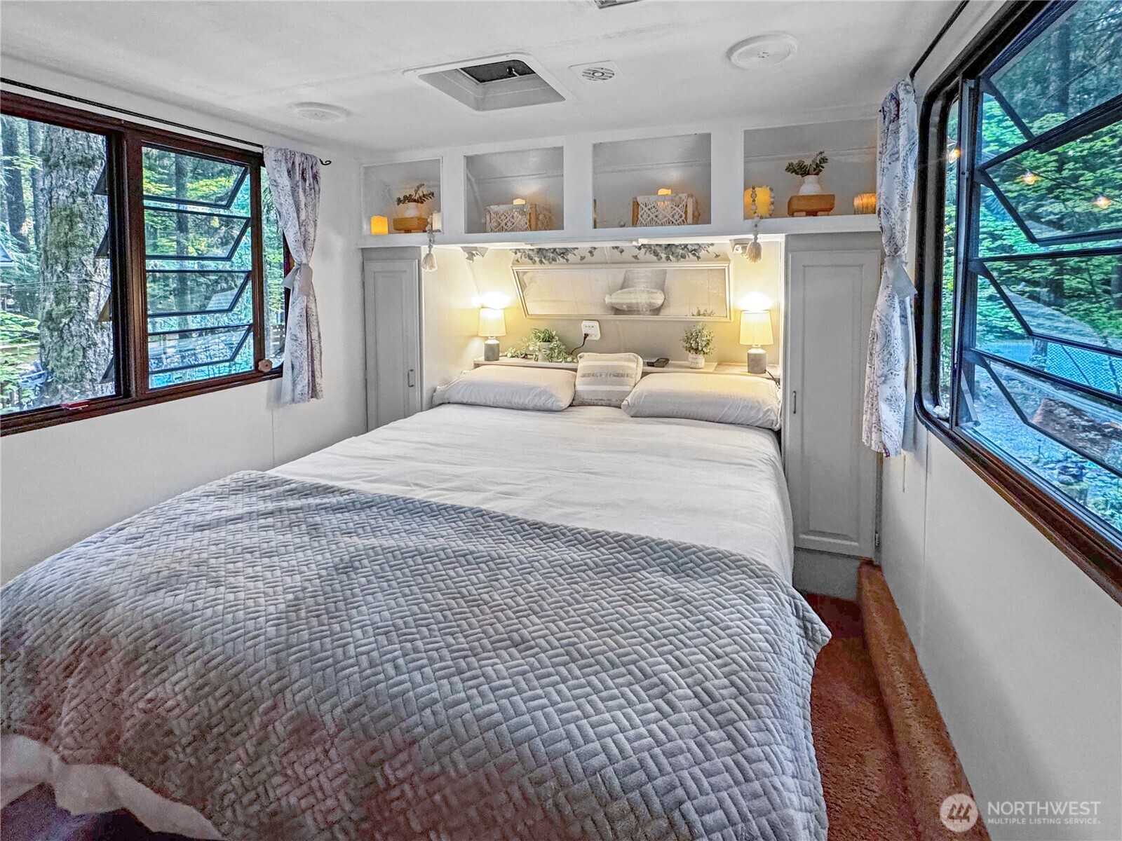 175-6 Chantrelle Drive Deming, WA 98244 - Photo 13 of 40 a bedroom with a bed and a large window with the outer view