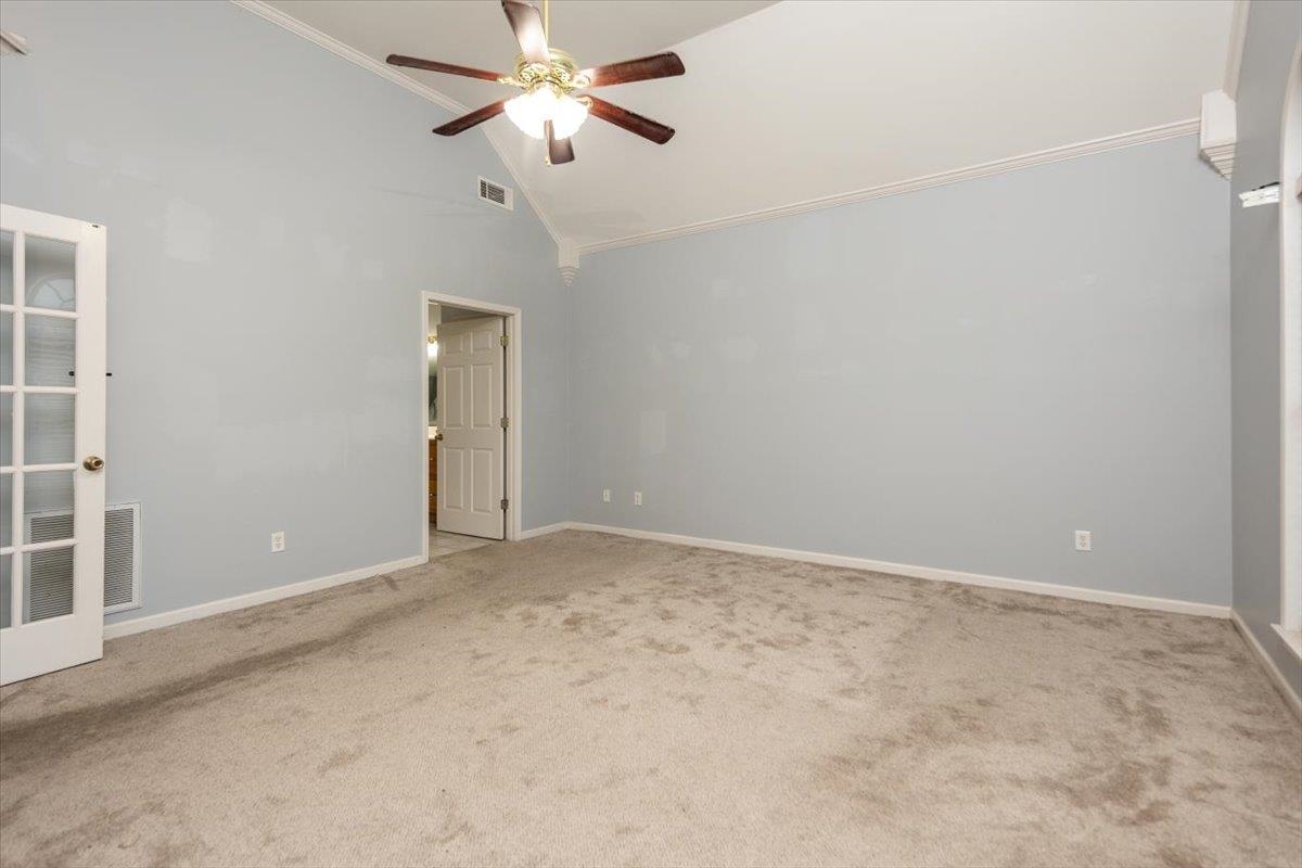 346 Beaver Road Munford, TN 38058 - Photo 14 of 24 Master bedroom with ornamental molding, ceiling fan, and carpet floors