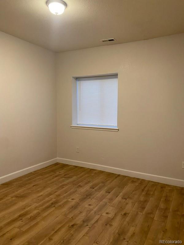4580 West Alameda Avenue Denver, CO 80219 - Photo 16 of 18 an empty room with a workbench