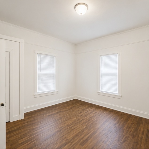 204 G Street Anderson, SC 29625 - Photo 5 of 8 Rich wood flooring graces this inviting space, ready for your personal touch.