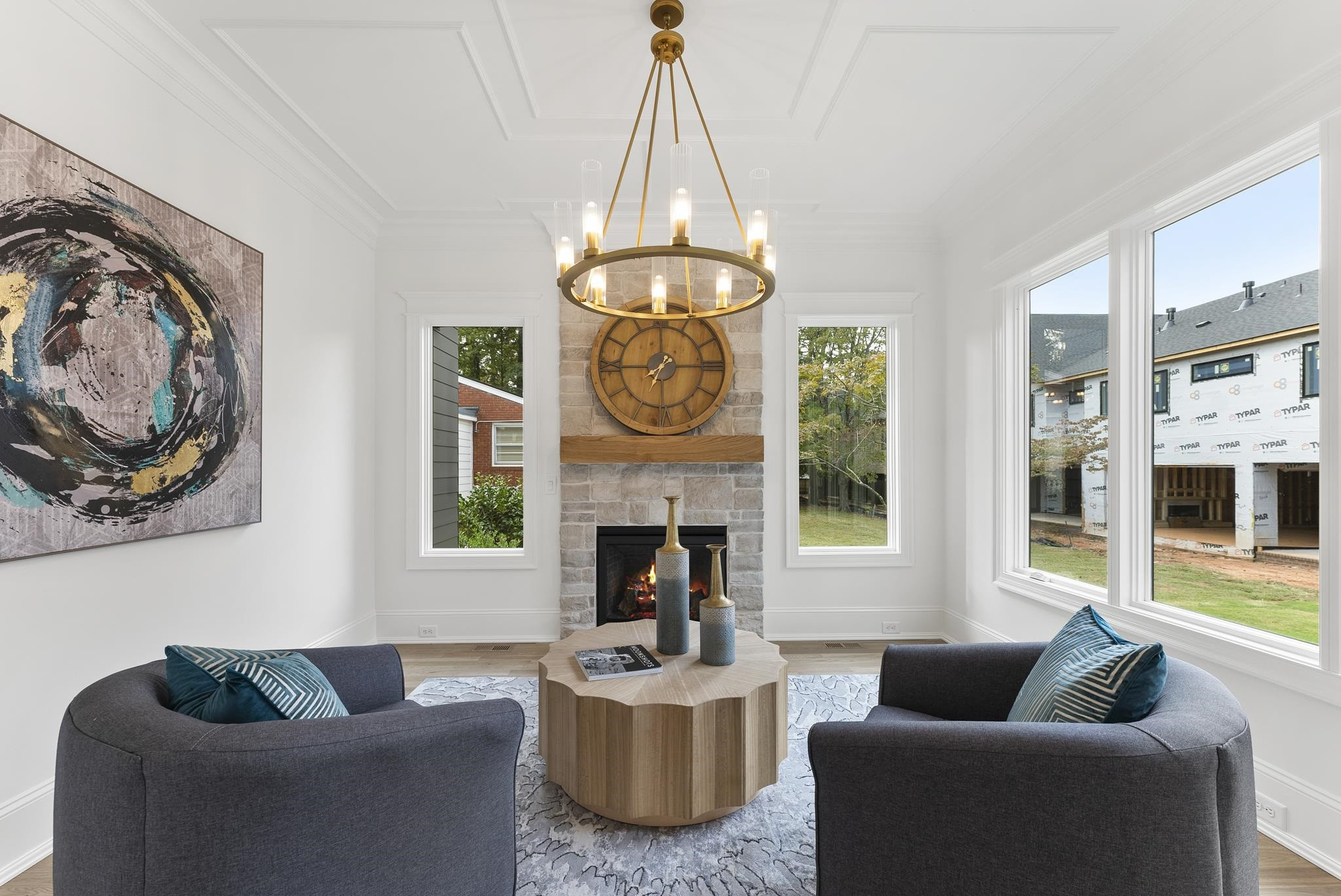 1419 Chester Road Raleigh, NC 27608 - Photo 14 of 41 a living room with furniture a chandelier and a fireplace