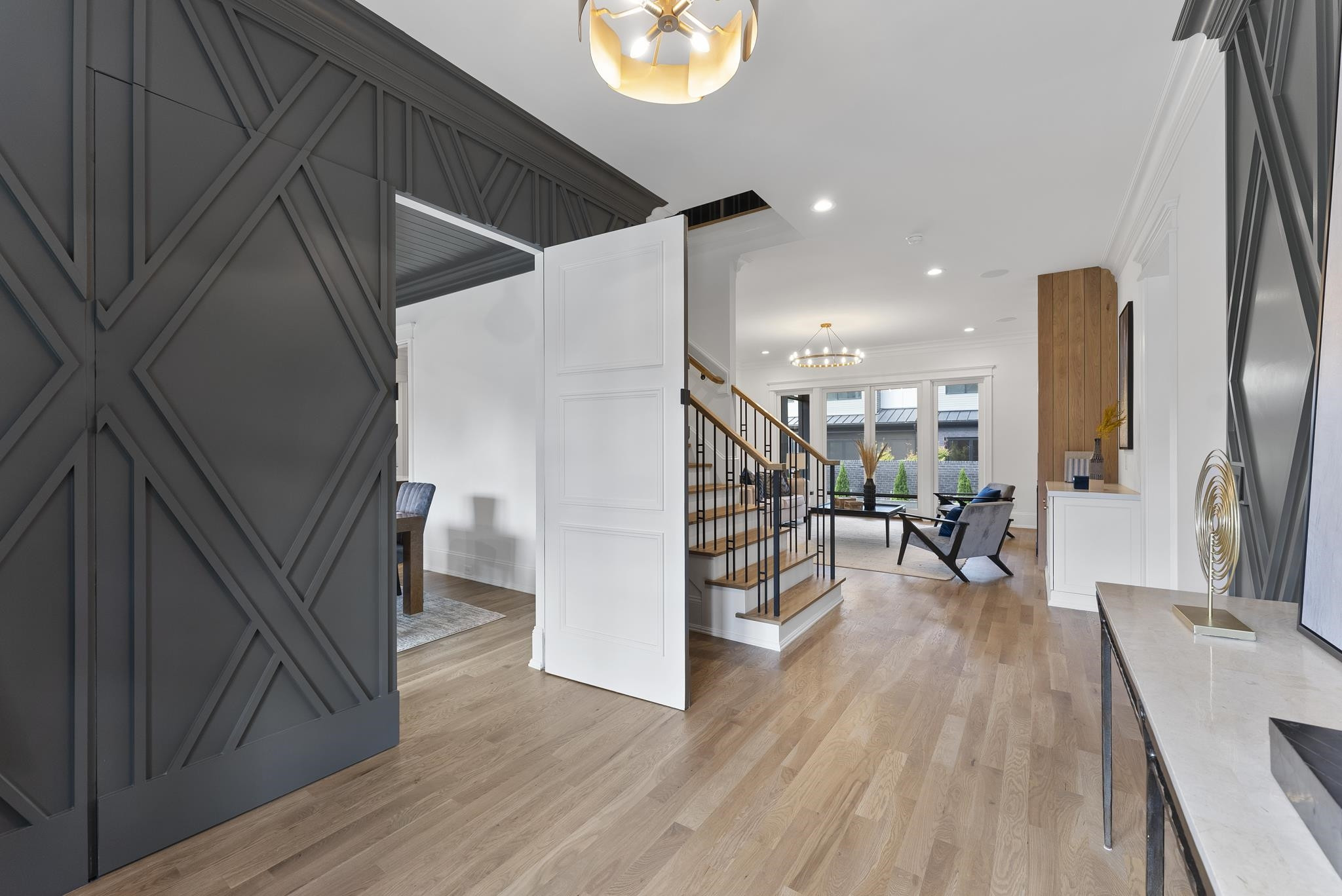 1419 Chester Road Raleigh, NC 27608 - Photo 3 of 41 a view of a hallway with wooden floor and furniture