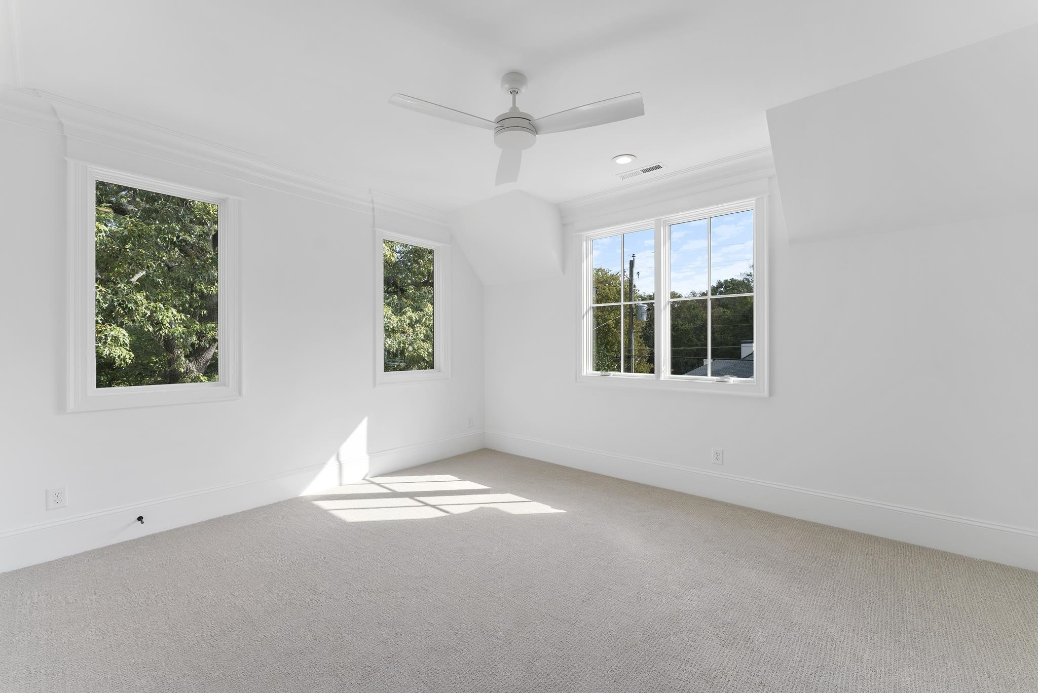 1419 Chester Road Raleigh, NC 27608 - Photo 40 of 41 an empty room with windows