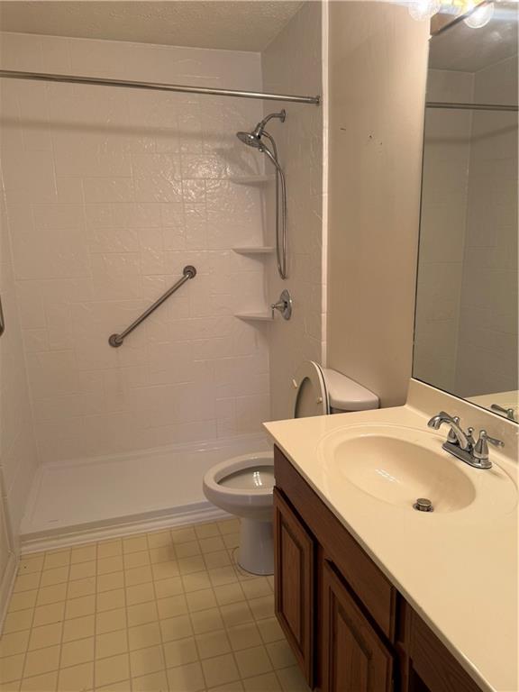 682 Bridge Way Lithonia, GA 30058 - Photo 23 of 25 a bathroom with a sink a toilet and shower