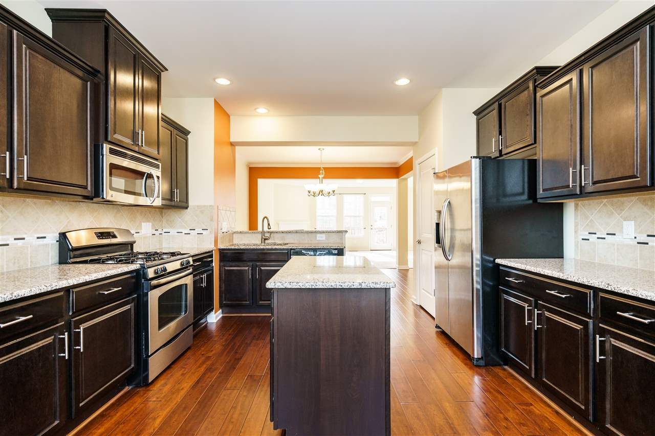 5635 Wade Park Boulevard Raleigh, NC 27607 - Photo 11 of 25 Spacious and perfectly designed for prep work and cooking! Enjoy the abundance of kitchen storage in cabinets and pantry. Kitchen