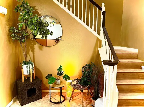 a view of entryway with wooden floor