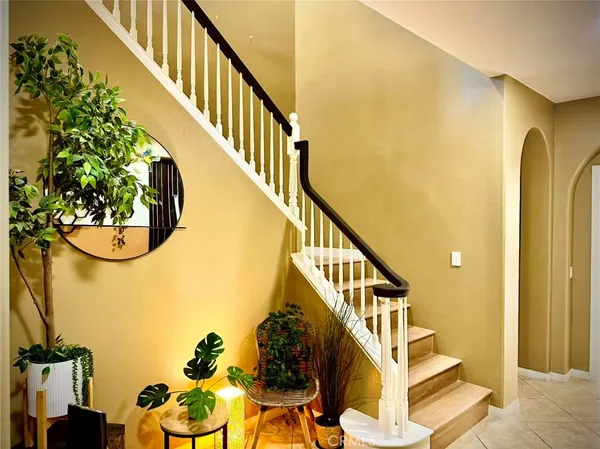 a view of a dining room with furniture and window