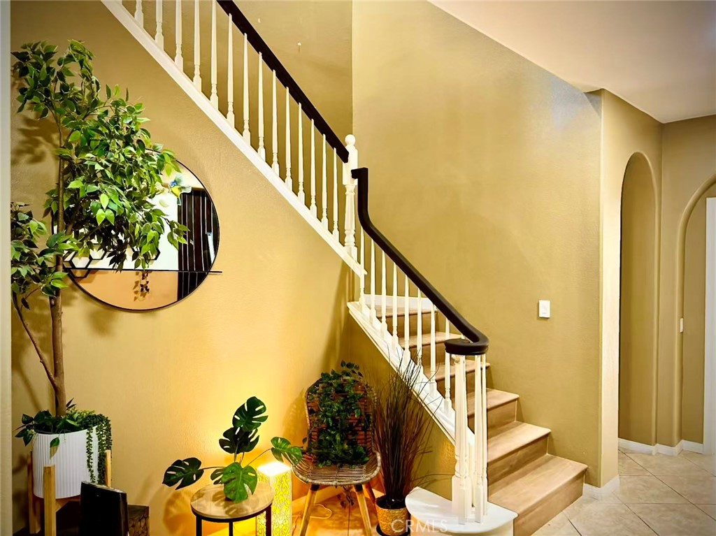 6805 Edinburgh Road Eastvale, CA 92880 - Photo 3 of 47 a view of entryway with wooden floor