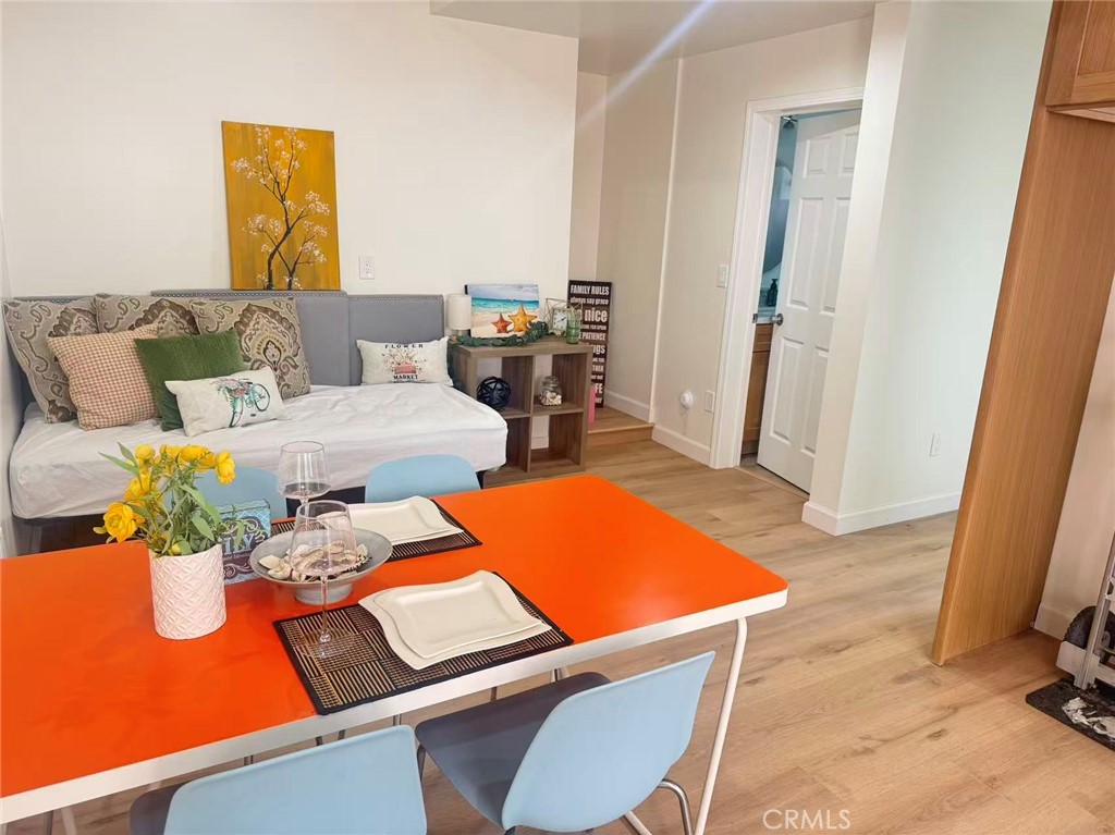 6805 Edinburgh Road Eastvale, CA 92880 - Photo 32 of 47 a room with furniture and a table