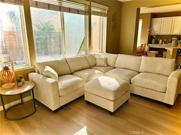 a living room with furniture and a table