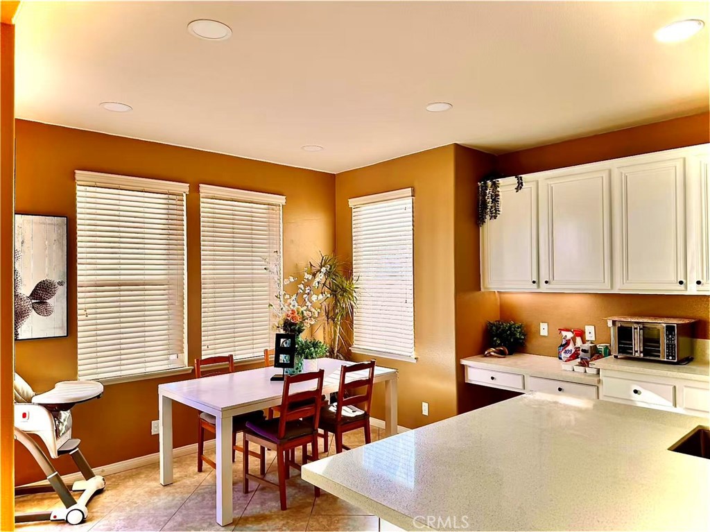 6805 Edinburgh Road Eastvale, CA 92880 - Photo 39 of 47 a very nice looking room with a large window