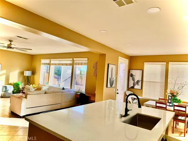 a room with a dresser and a mirror