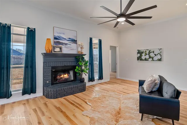 a bedroom with a bed and a fireplace