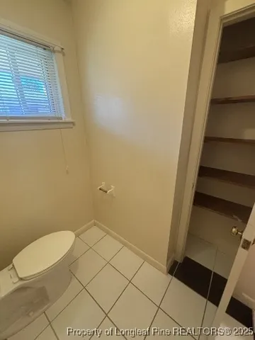 a bathroom with a toilet