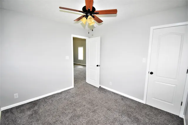 a view of balcony with wooden floor